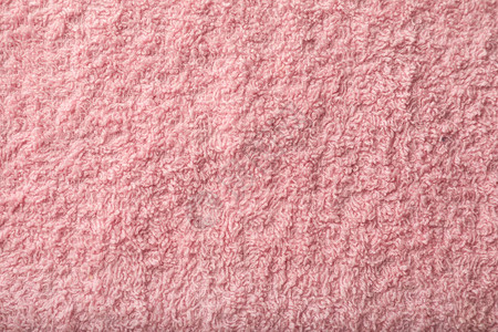 作为背景的粉红色毛巾布纹理图片