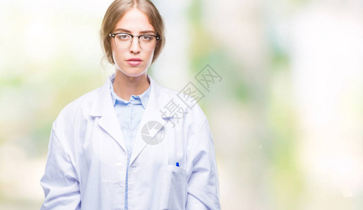 美丽的年轻金发女医生穿着白色大衣图片