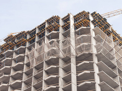 现代高层混凝土板式建筑的建设背景图片