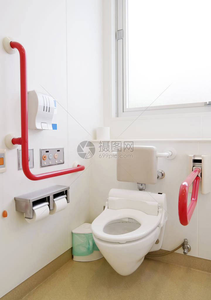 卫生间残疾人厕所的厕所和手扶器图片