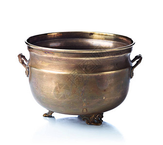 空的旧黄铜锅装饰手柄和腿孤图片