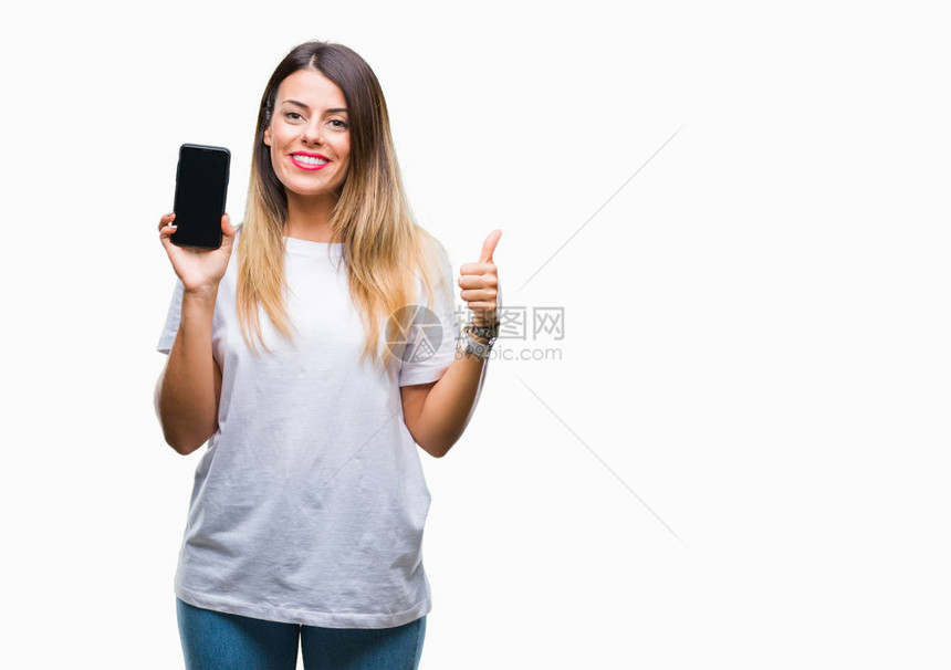 年轻美女在孤立的背景下展示智能手机的空白屏幕图片