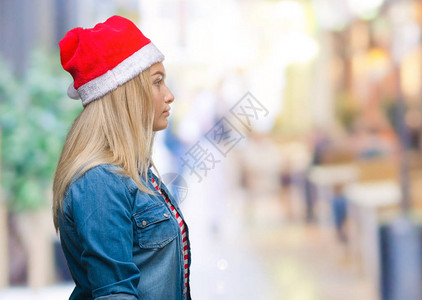 穿着圣诞帽的年轻caucasian女人图片