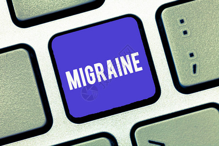 手写文字Migraine概念的意思是反复的抽搐头痛图片