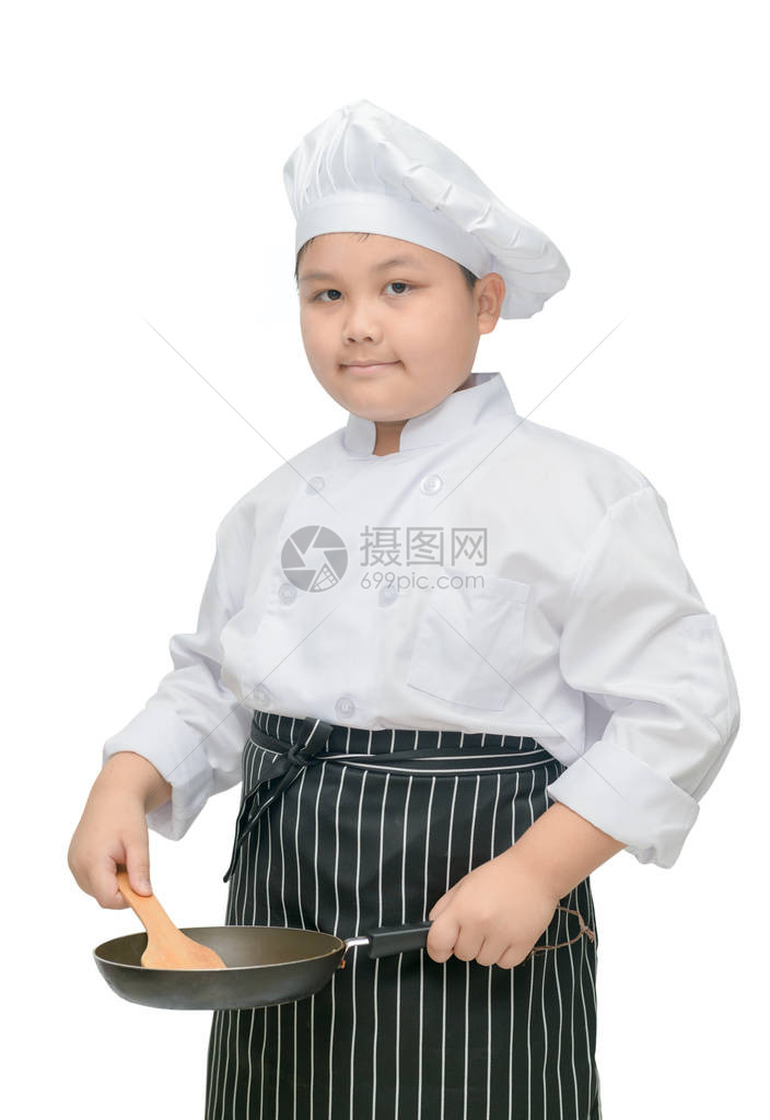 胖男孩厨师拿着脚钳在白色背图片