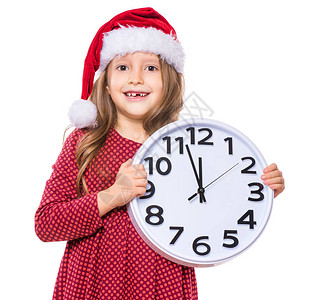 假日圣诞节概念拿着大时钟的愉快的逗人喜爱的孩子图片