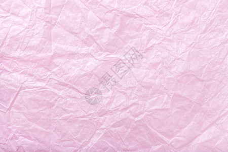折叠粉红色包装纸的纹理三合金图片