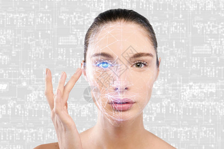 用于面部识别和被扫描人的美丽女人面部的未来主义和技术扫描它可以起到确保人身安全的作用概念背景图片