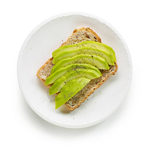 以新鲜的鳄梨三明治作为健康的三明治板图片