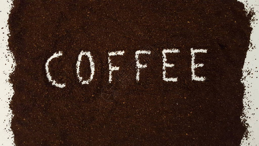 咖啡粉中的咖啡白色背景上的咖啡研磨咖图片