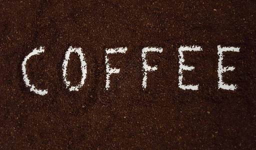 咖啡粉中的咖啡白色背景上的咖啡研磨咖图片