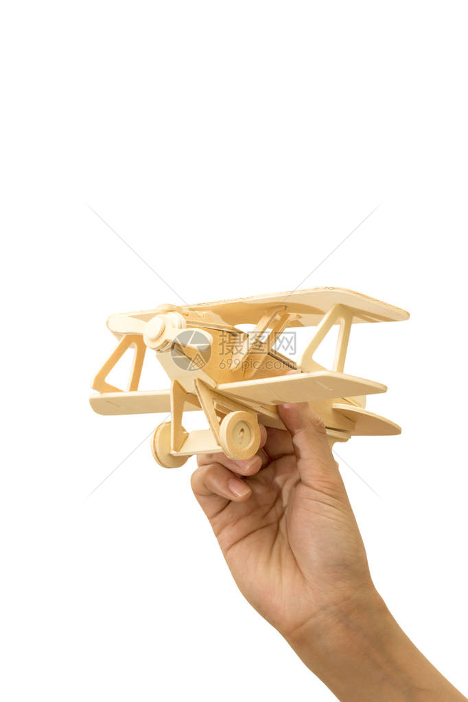 手持玩具飞机在白色背景和剪切图片