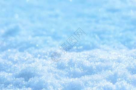 蓝色调的雪纹理白雪的质地与雪背景图片