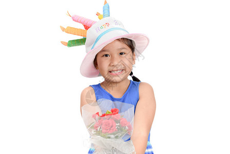 可爱的小女孩戴着快乐的生日帽子图片