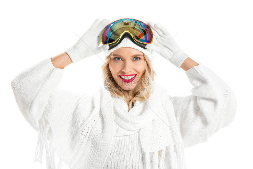 身着冬衣头戴滑雪护目镜的年轻美女图片