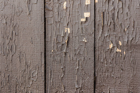 棕色剥皮涂料的木板老木质背景旧油图片