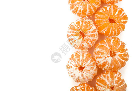 一堆去皮的橘子或橘子连续被隔离图片