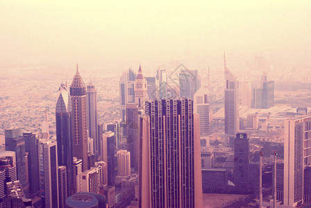 迪拜天空线的粉红早晨摘要模糊的刻底背景阿拉伯联合酋长国建筑Name图片