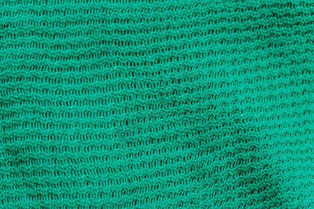 绿色针织质地针织布背景图片