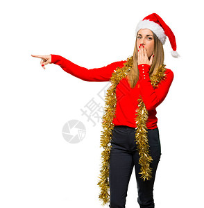 金发女人穿着衣服去过圣诞节手对面指着一脸奇异的脸蛋与世隔图片