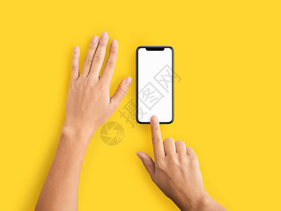 智能手机指纹扫描安全和隐私保护使用黄色背景空白屏幕手机的图片