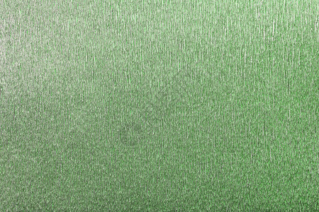 波浪瓦楞纸的绿色箔背景纹理图片