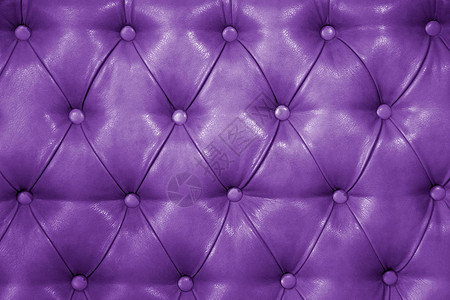 真正的紫色皮革软垫家具的质地真正的绗缝皮革capitone纹图片