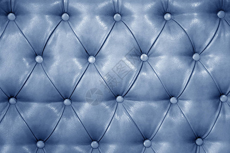 真正的浅蓝色皮革软垫家具的质地真正的绗缝皮革capitone纹图片