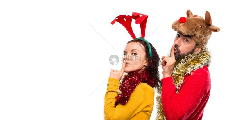 穿着圣诞节日服装的一对夫妇图片