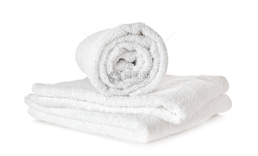 白色背景上的一堆干净柔软的毛巾图片