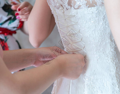 婚礼新娘礼服婚纱缝合式关闭图片