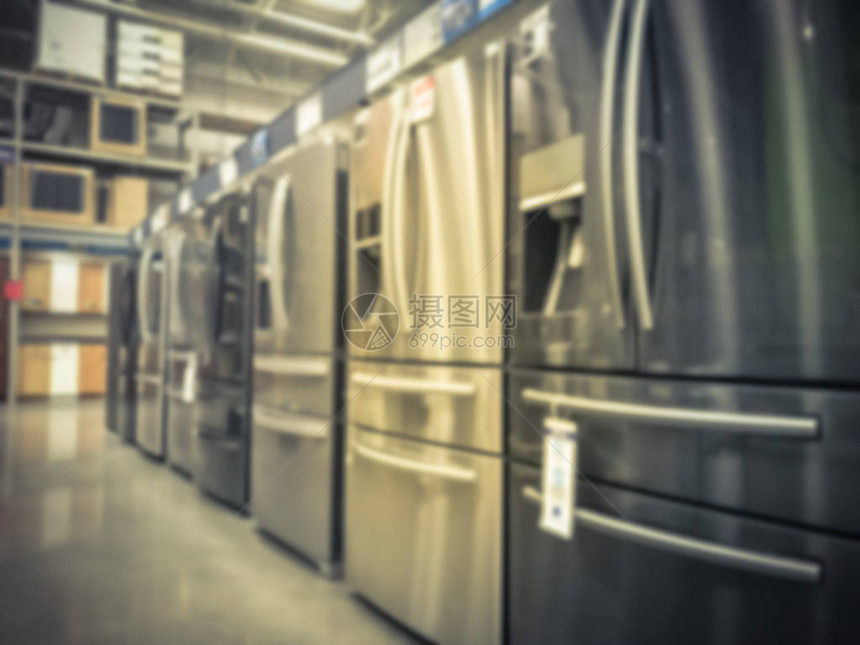 美庭改良店门式冰箱冷藏室的一排崭模糊的全图片