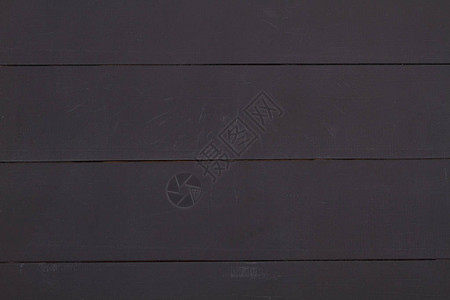 关闭由木板制成的墙以纹理为背景的黑色木板图片