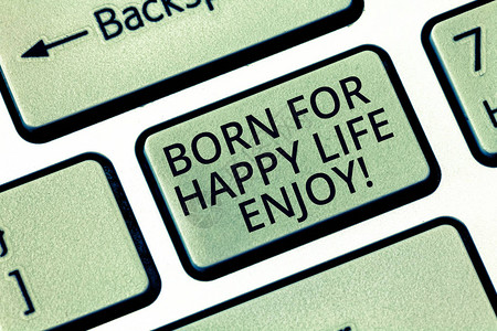 文字书写文本为快乐生活而生享受新生儿快乐享受生活方式的商业理念键盘意图创建计算机消息背景图片