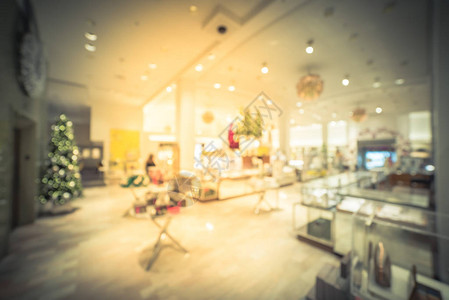 假日季节在美国德克萨斯州达拉斯市中心的高档服装店购物的动作模糊离焦昂贵的鞋子手袋珠宝配背景图片