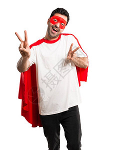 戴着面罩和红色披风的超级英雄男子微笑图片
