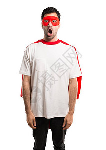 超级英雄戴面罩和红色披风图片