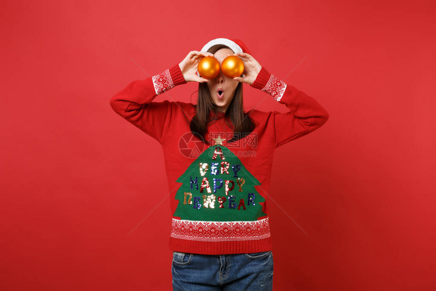 戴着圣诞帽的圣诞小女孩惊讶地张着嘴图片