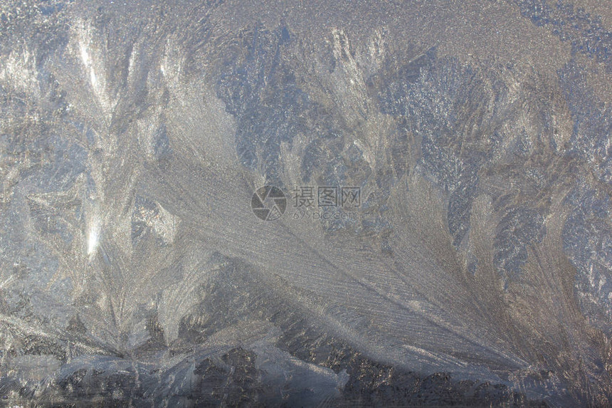 冬天窗户上的冰霜模式图片
