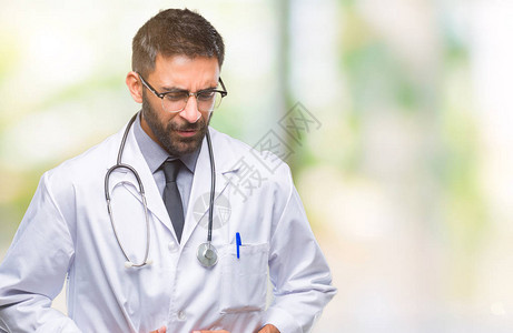 成年西班牙裔医生男子因消化不良痛苦的疾病感觉不适图片