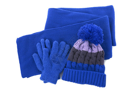 蓝色冬季针织泡帽围巾手套隔离背景图片