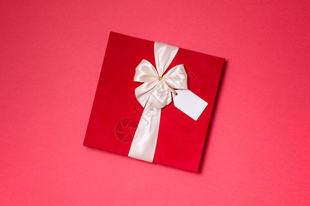 情人节浪漫的礼物彩带弓吉夫特标签无缝红背景图片