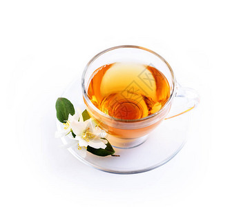 亚洲绿茶与茉莉花在透明茶杯中图片