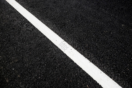 道路纹理上的新白线图片