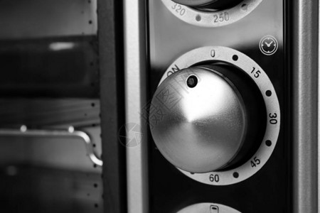 现代电烤箱调节器特写图片