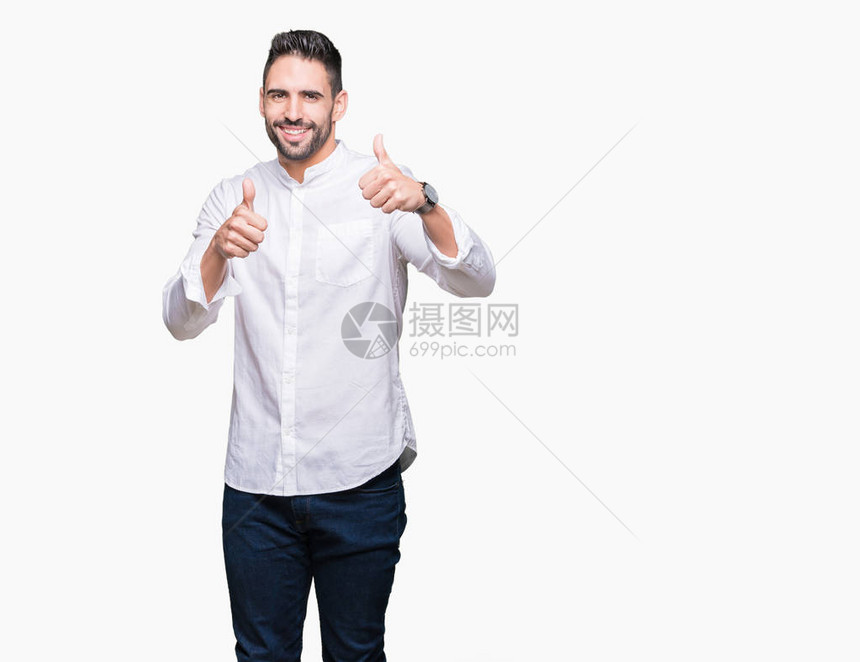 年轻商人在孤立的背景成功标志用手做积极的手势图片