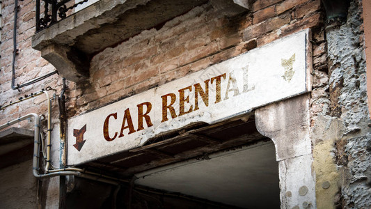 墙上的汽车租赁标志背景图片