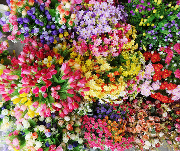 美丽多彩姿的人造花背景鲜花装饰图片