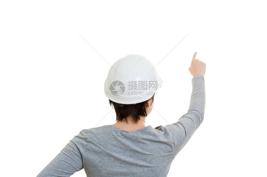 身着防护头盔的年轻女工程师的后视线指向前方图片