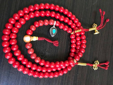 虚脱使用108颗珠子的Malas一些练习者使用21或28颗珠子做大礼拜在藏传佛教中背景